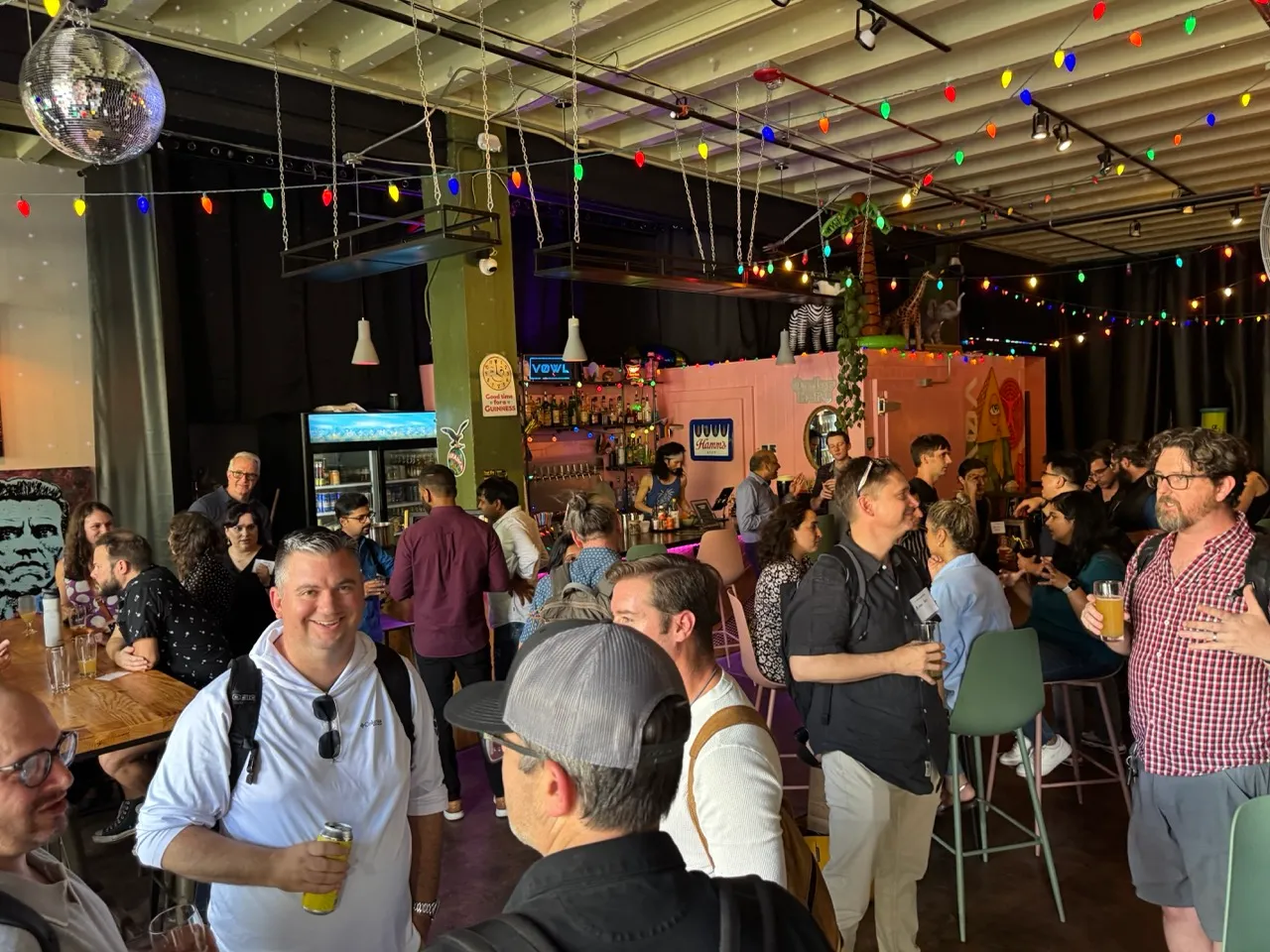 Conference attendees discussing AI challenges