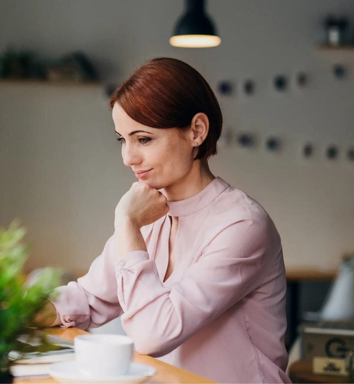 An accountant reviewing Digits financials at her desk
